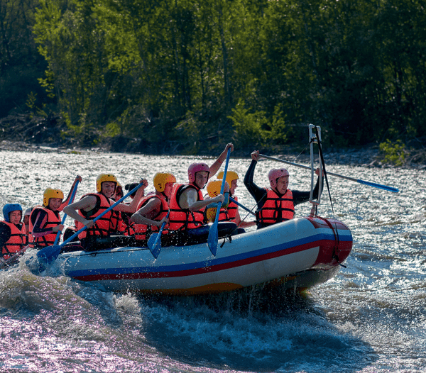 Picture of a crew whitewater rafting in Gatlinburg.