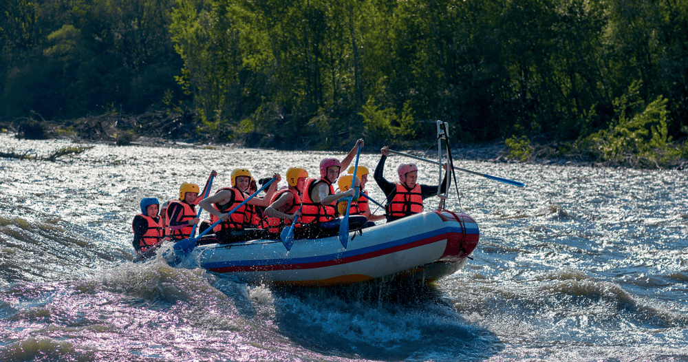 Picture of a crew whitewater rafting in Gatlinburg.