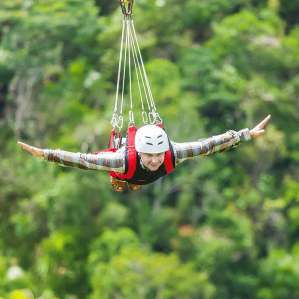 Picture of person on a Gatlinburg zipline course.