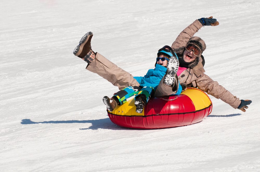 Picture of family snow tubing in Gatlinburg.