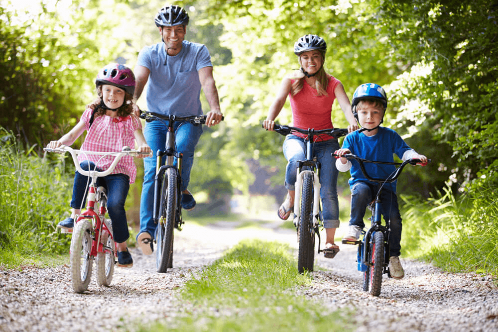 Picture of a family on bikes on a Gatlinburg Bike Trail.