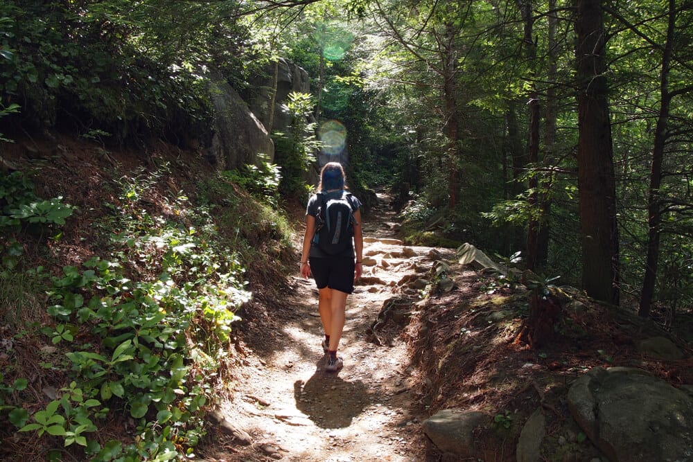 A photo of a woman hiking in Gatlinburg.