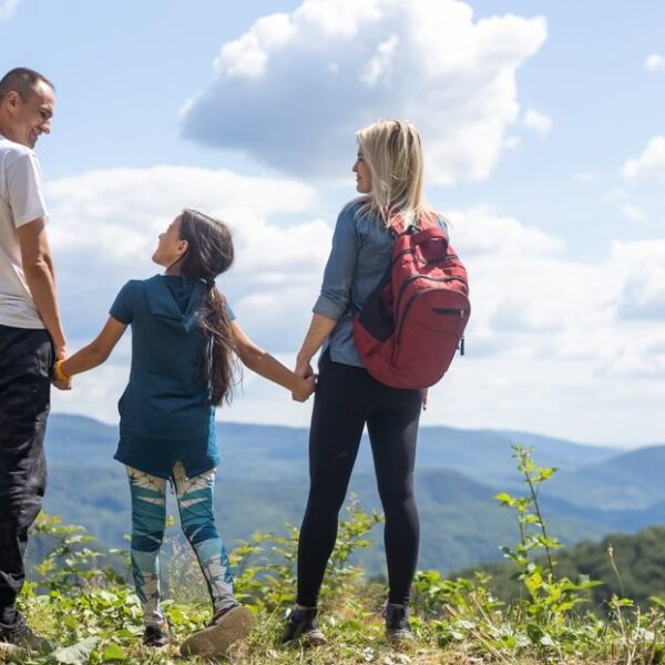 A family hiking on their summer vacation in Tennessee to Gatlinburg.