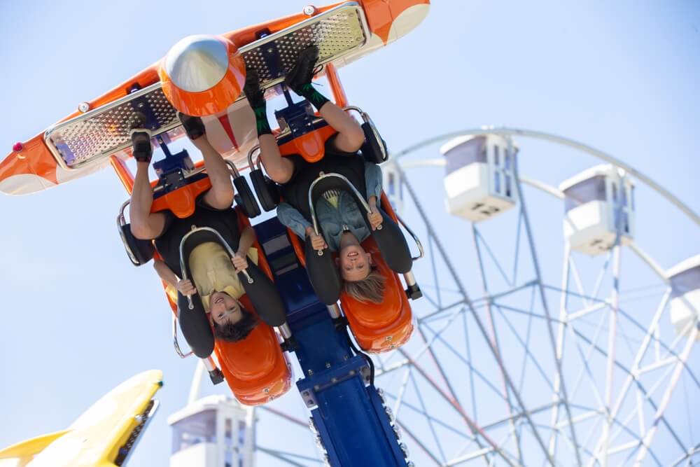 People riding a ride at one of the theme parks in Tennessee near Gatlinburg.